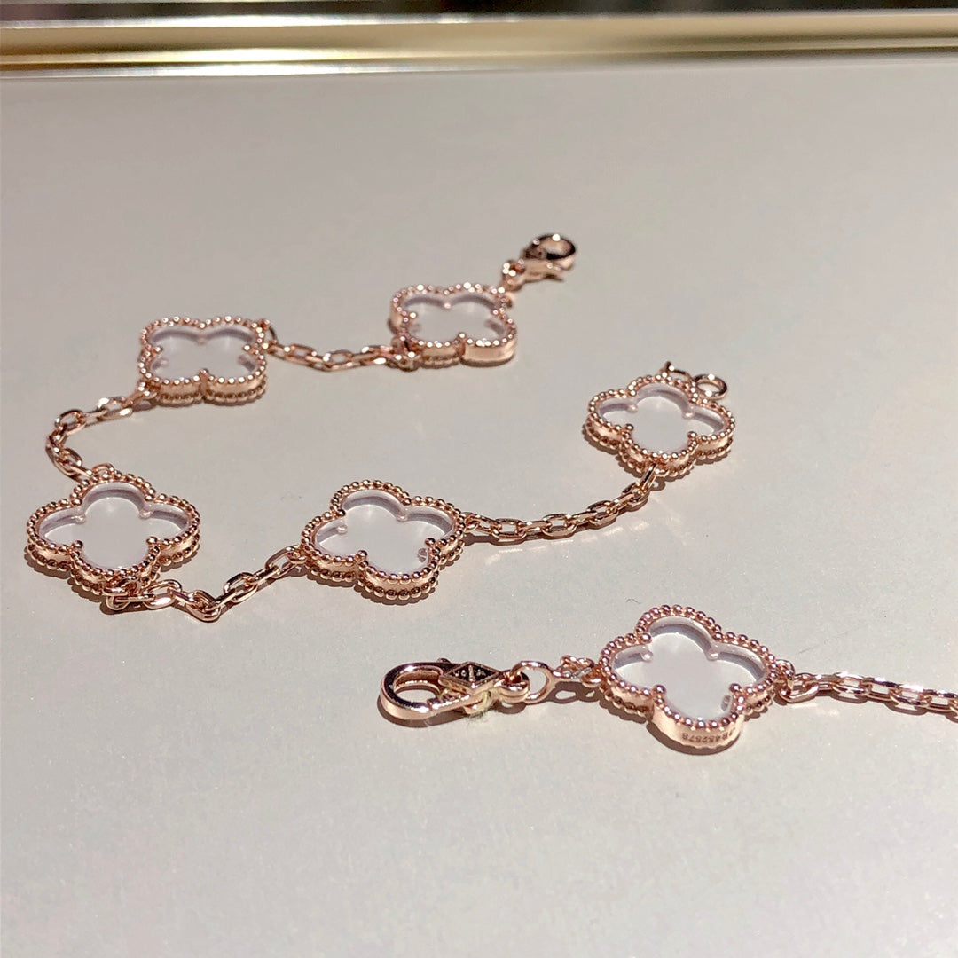 PULSERA DIANA CLOVER DE ORO ROSA CON CRISTAL DE ROCA Y 5 MOTIVOS