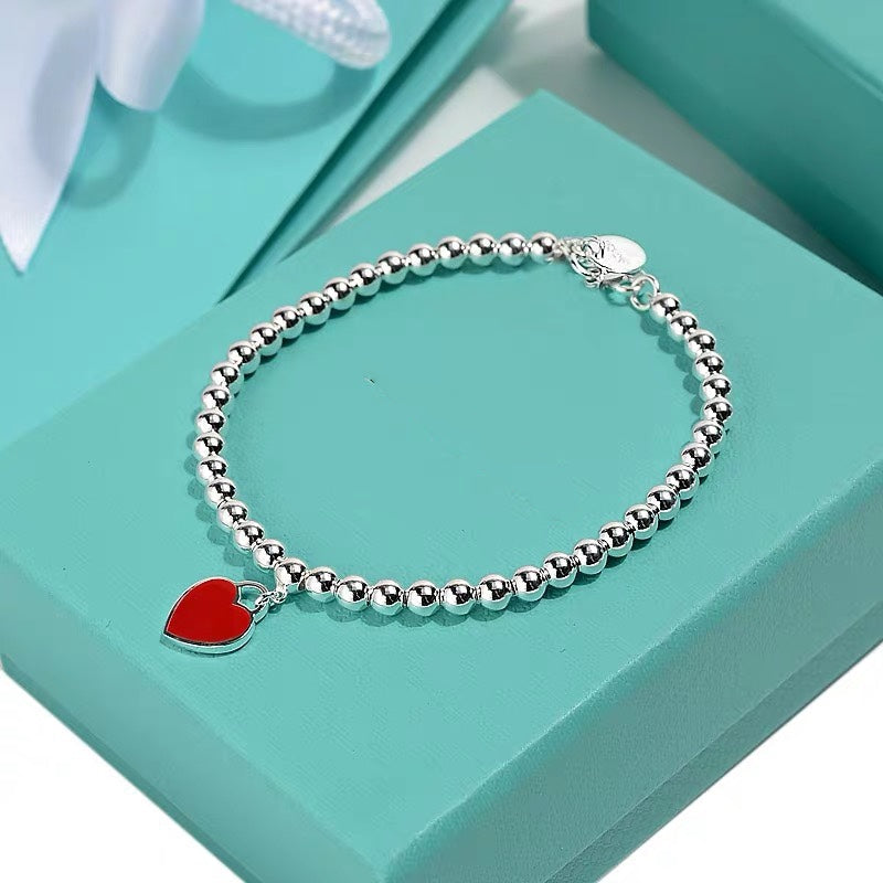 MINI PULSERA CORAZÓN PLATA
