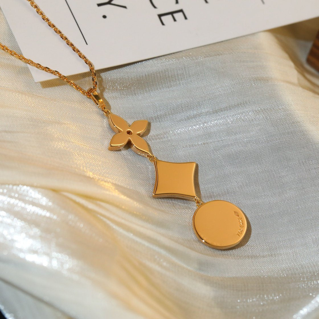 DIANA STAR AND SUN DIAMOND PINK GOLD NECKLACE
