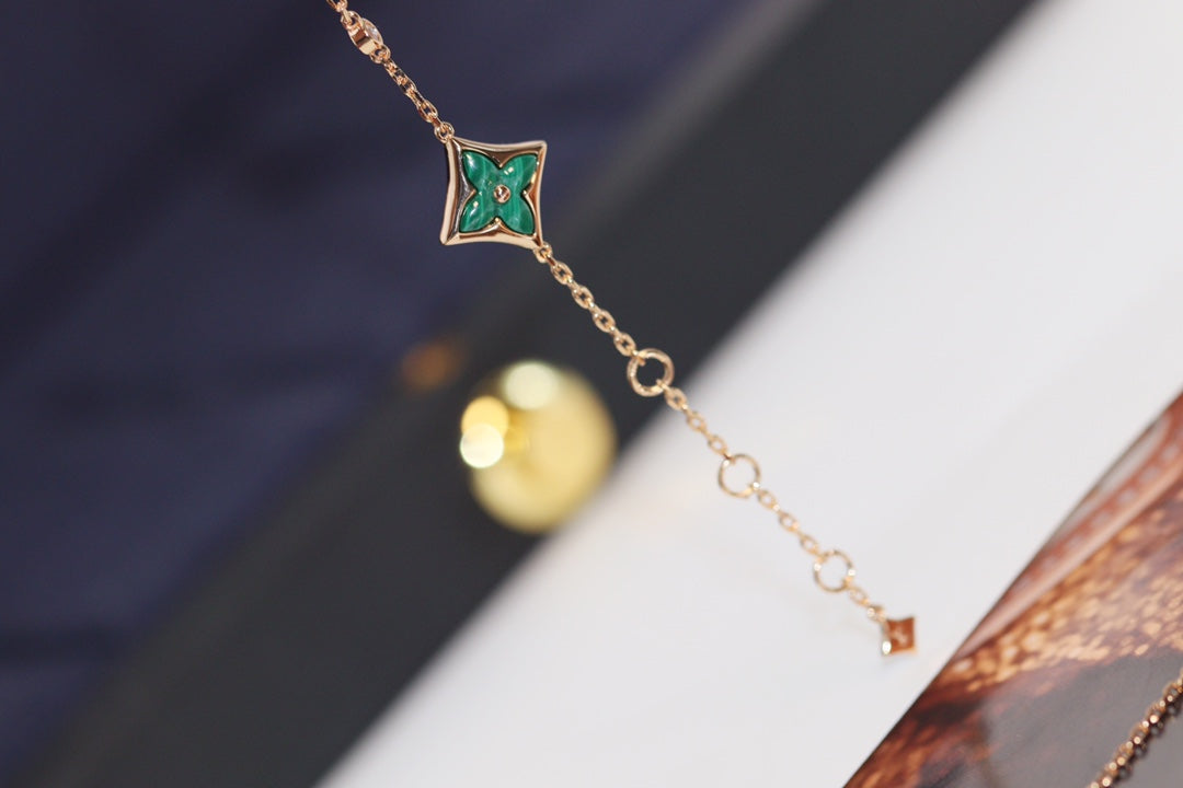 DIANA STAR AND SUN 4 MOTIF PINK GOLD MALACHITE BRACELET