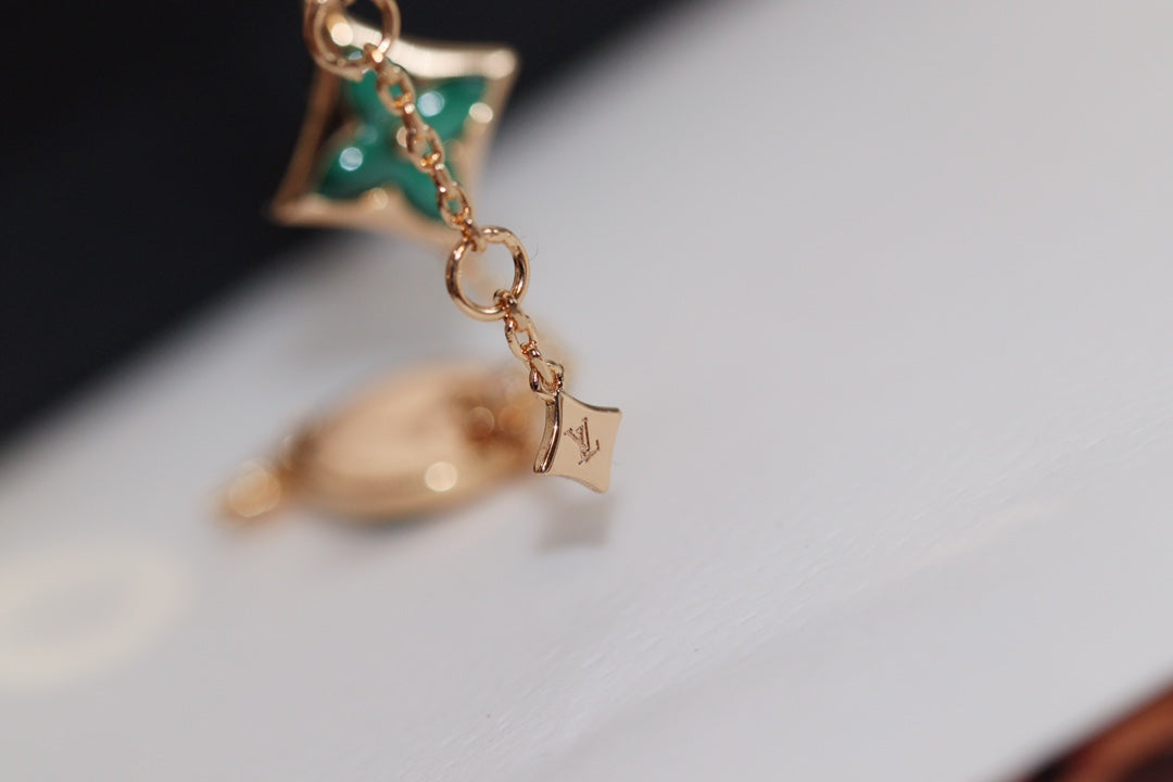 DIANA STAR AND SUN 4 MOTIF PINK GOLD MALACHITE BRACELET