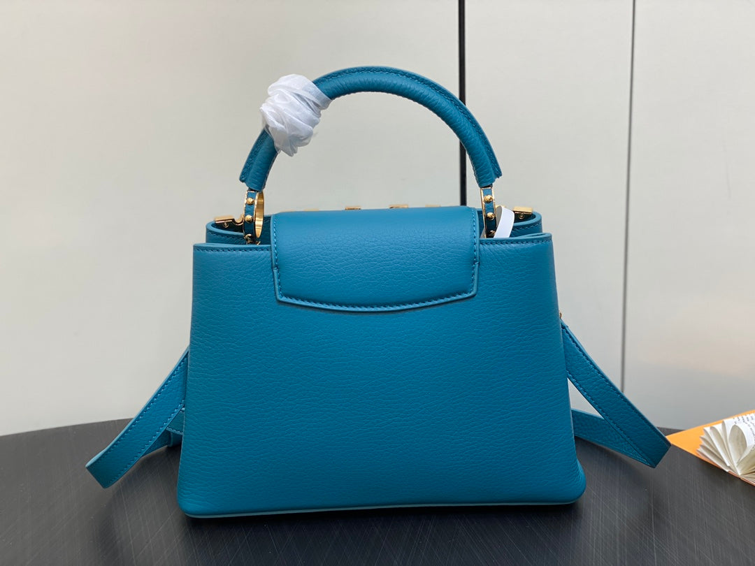 CAPUCINES BB 27 AZUL TAURILLON HARDWARE DORADO