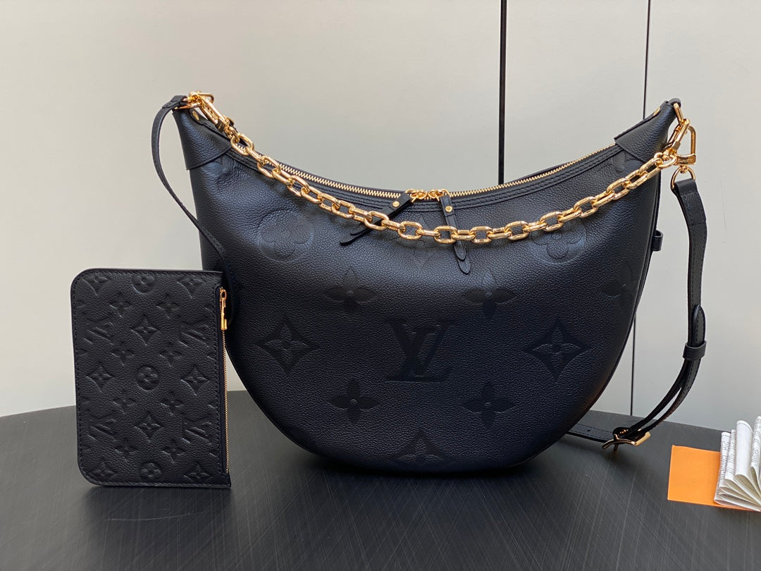 LOOP HOBO 38 NEGRO MONOGRAMA IMPRESO CUERO HARDWARE DORADO
