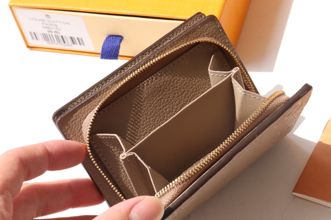 CARTERA CLEA 12CM PIEL EMPREINTE MONOGRAMA BEIGE