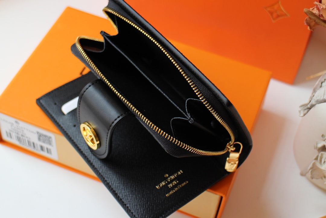 CARTERA JULIETTE 13.5 LONA MONOGRAMA MARRÓN NARANJA