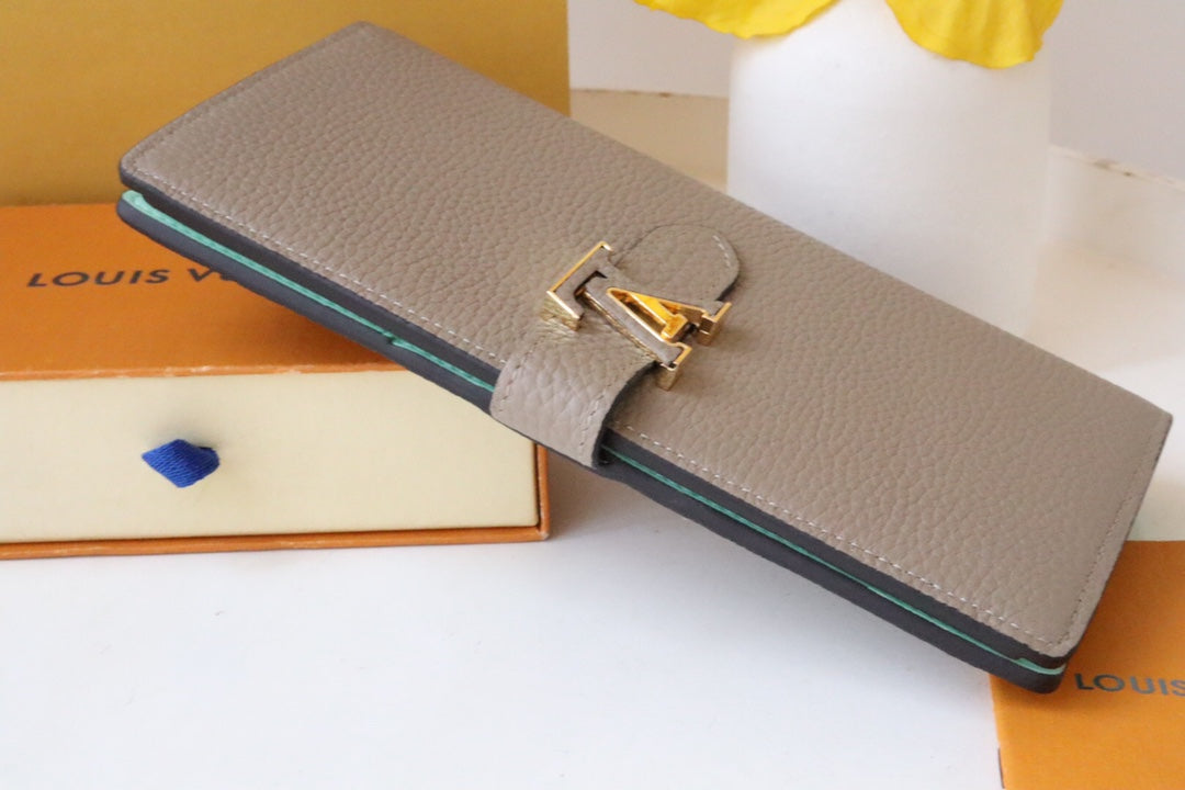 CARTERA VERTICAL CAPUCINES GRIS