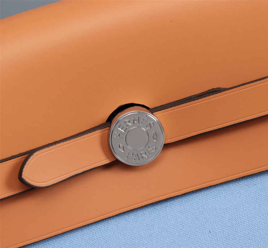 HM HERBAG ZIP 31 LONA CIELO Y BRONCE