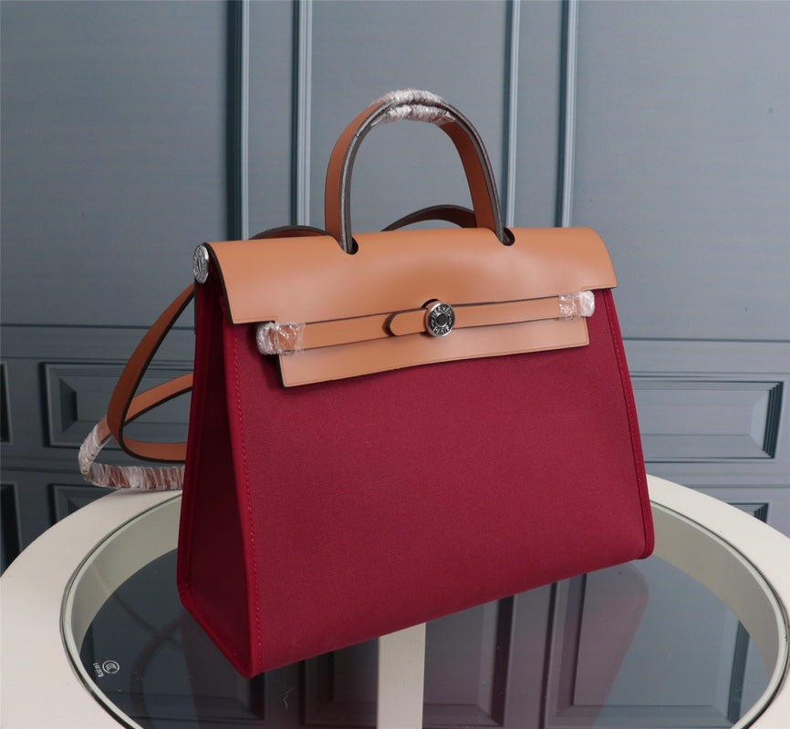 HM HERBAG ZIP 31 LONA ROJO VINO Y COBRE
