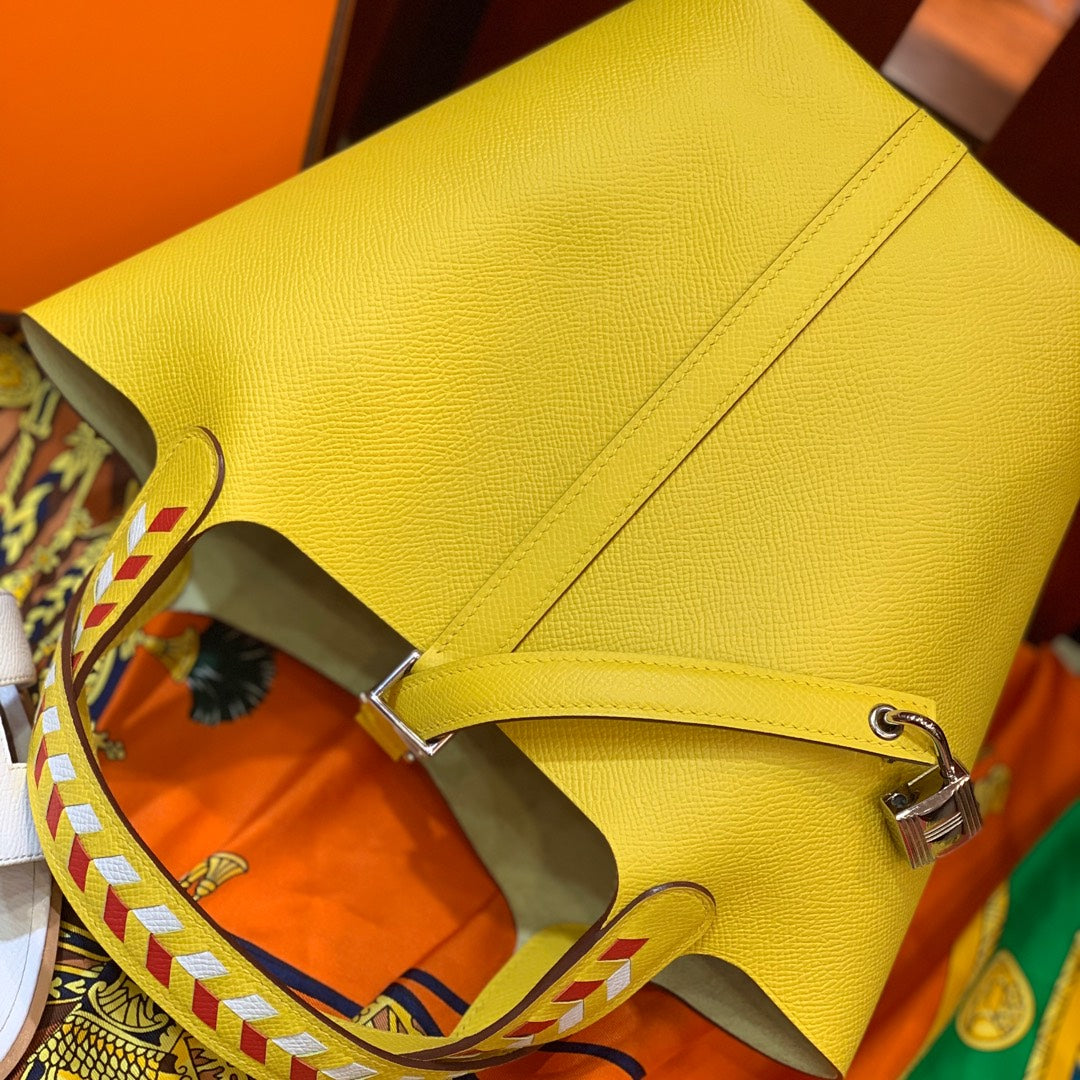 HM PICOTIN LOCK 18 EPSOM CITRON AVEC SANGLE TRESSE