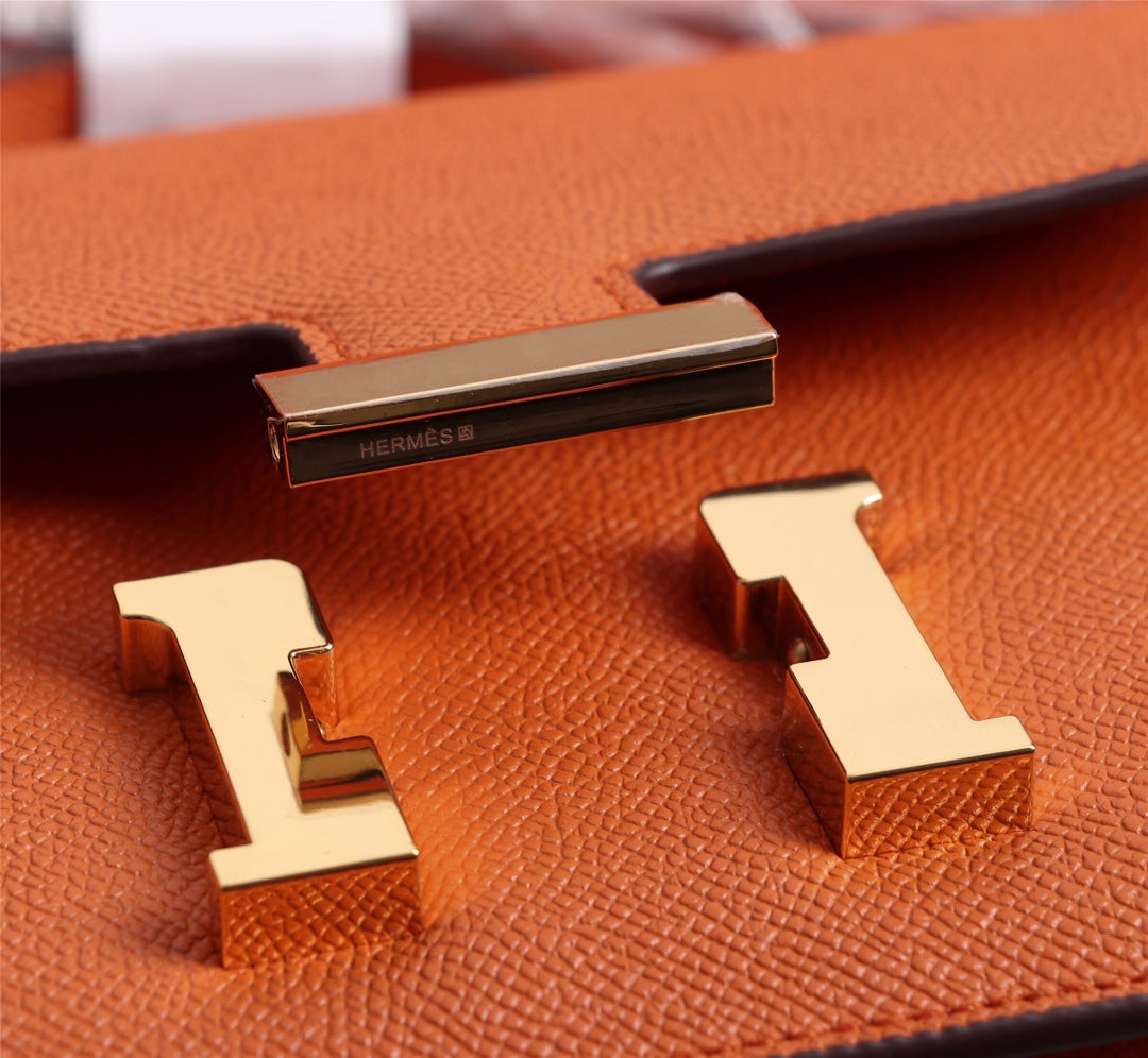 SACS HM CONSTANCE 19 ORANGE EPSOM QUINCAILLERIE OR