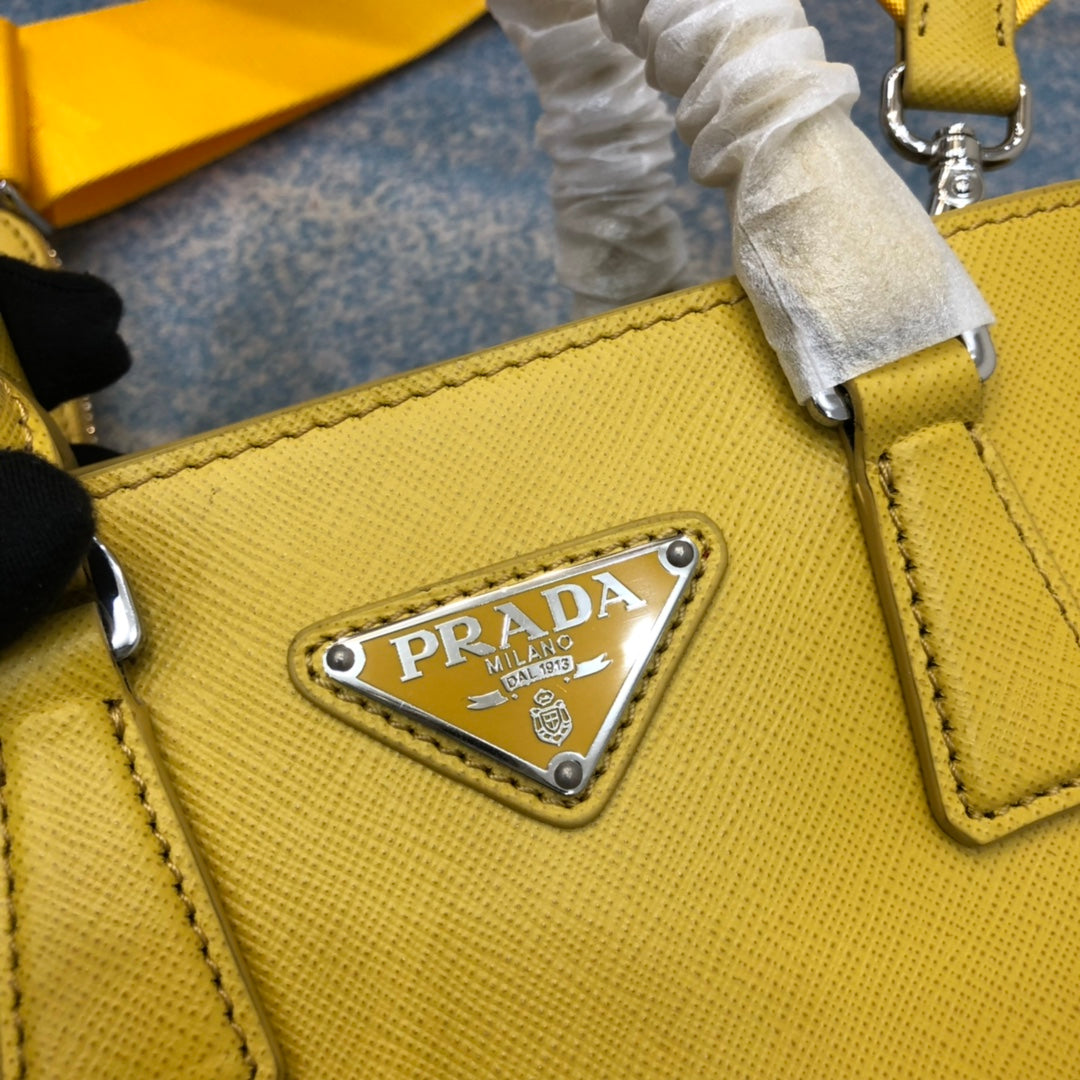 BOLSO PRA MINI 23 EN PIEL SAFFIANO AMARILLO SOLEADO
