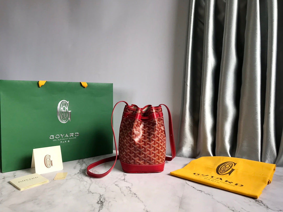 BOLSO DE CUBO PETIT FLOT 22 EN LONA GOYARDINE ROJA CLÁSICA Y RIBETE DE PIEL DE CORDERO