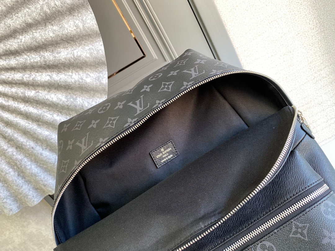 MOCHILA DISCOVERY 40 EN LONA NEGRA CON MONOGRAMA