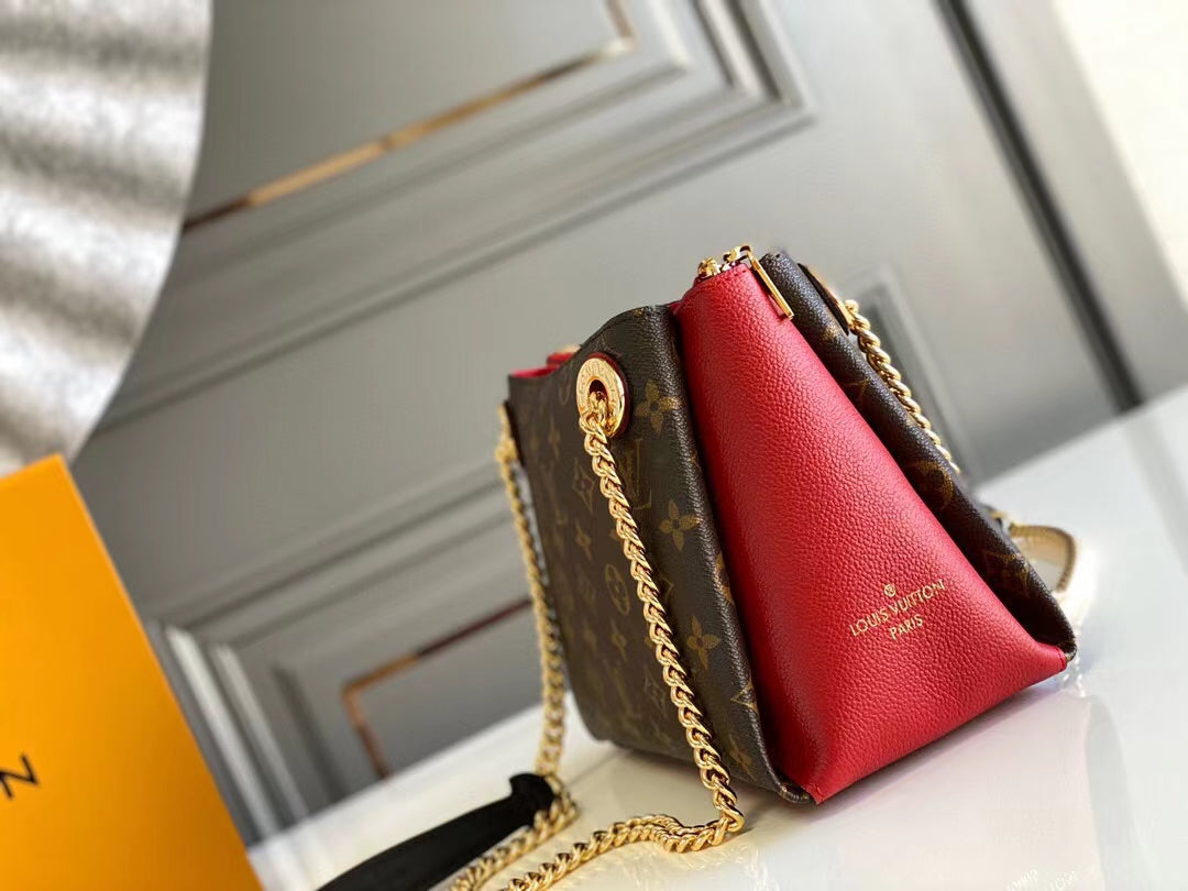 Bolso de hombro Surene BB de 24 cm con cadena y lona monograma de piel de becerro roja