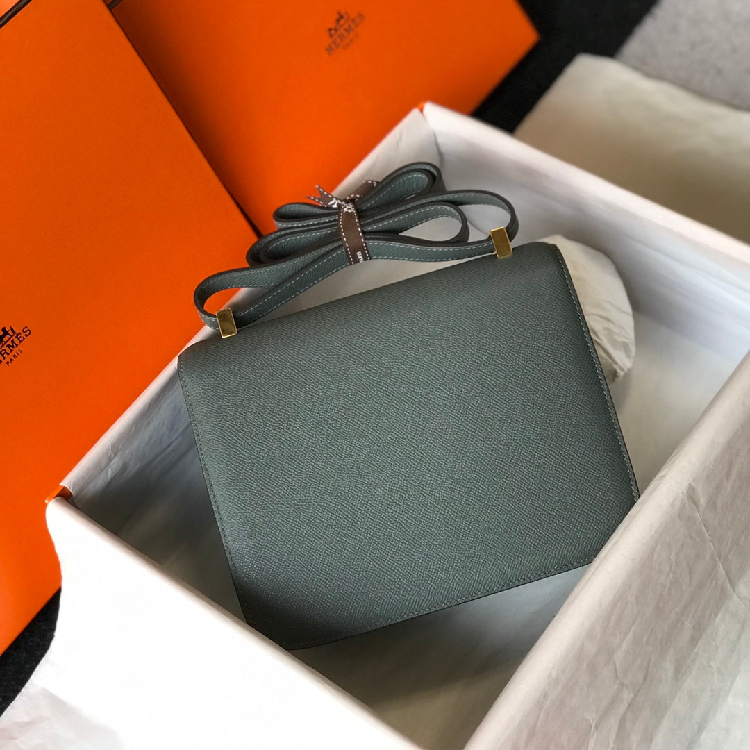 Constance 24 azul naranja, cuero Epsom, herrajes dorados