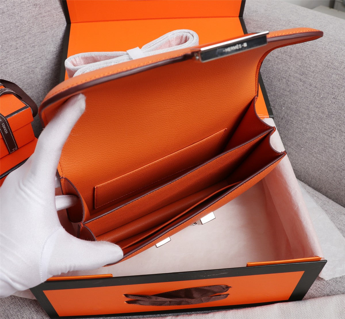 SACS HM CONSTANCE 22 ORANGE EPSOM QUINCAILLERIE ARGENTÉE