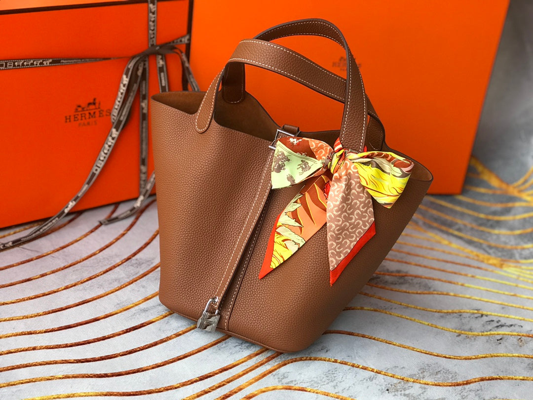 Cerradura picotin 18 dorada Togo shw