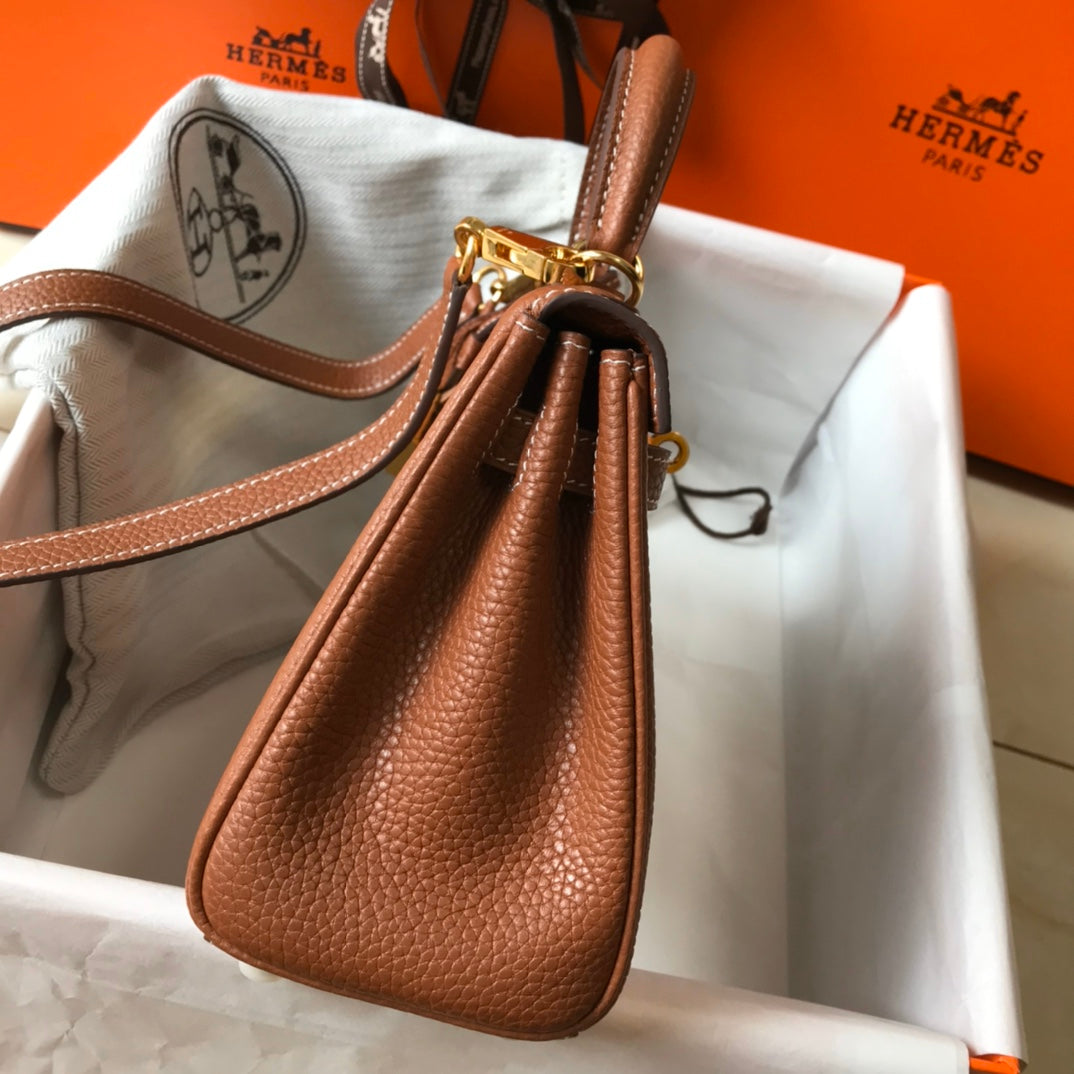 HM Mini Kelly 20 cm en cuir Togo doré avec accessoires dorés