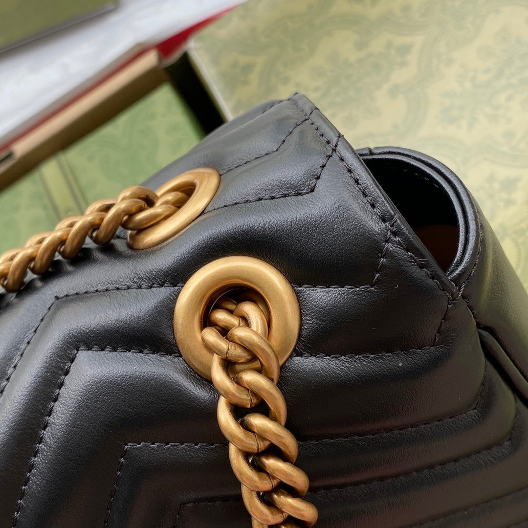 gg marmont 26 cm en cuir de veau noir avec accessoires dorés