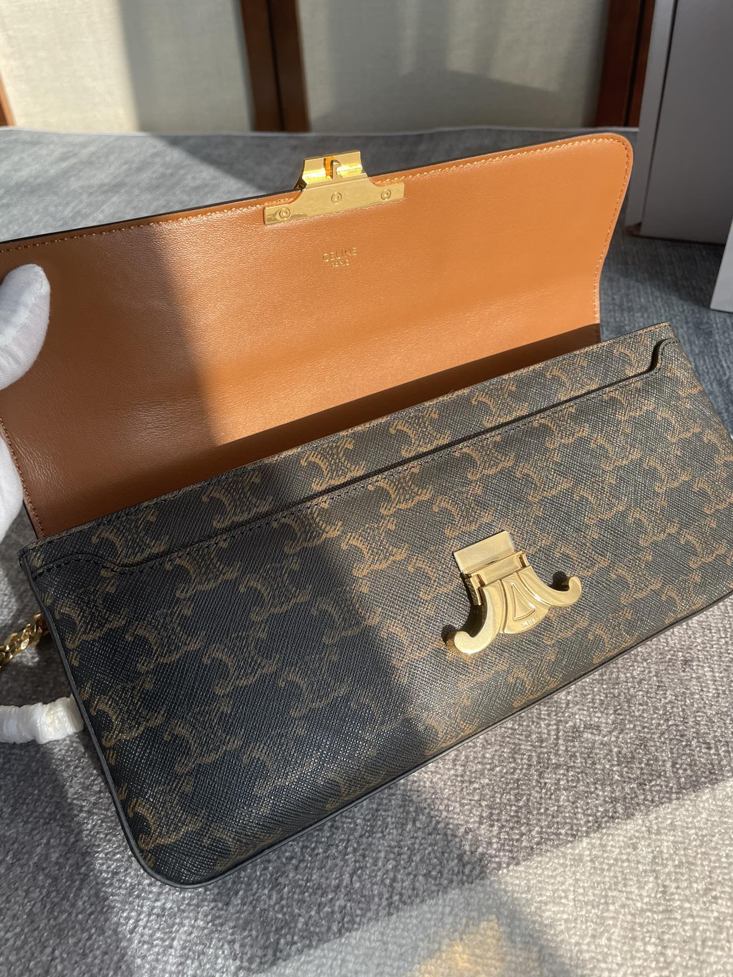 SAC À BANDOULIÈRE CHAÎNE CLAUDE 33 EN TOILE TRIOMPHE NOIRE ET QUINCAILLERIE DORÉ