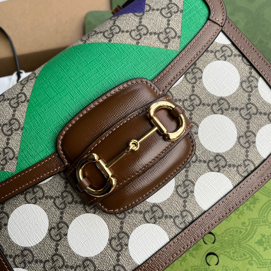 BOLSA DE ALFORJAS HORSEBIT 1955 25 EN LONA COLORIDA Y ADORNOS DE CUERO MARRÓN CON HERRAJES DORADOS