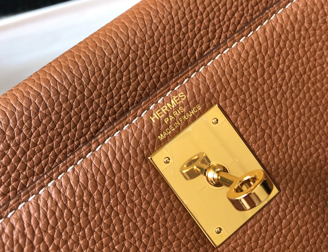 hm kelly 32 cm cuir togo doré accessoires dorés
