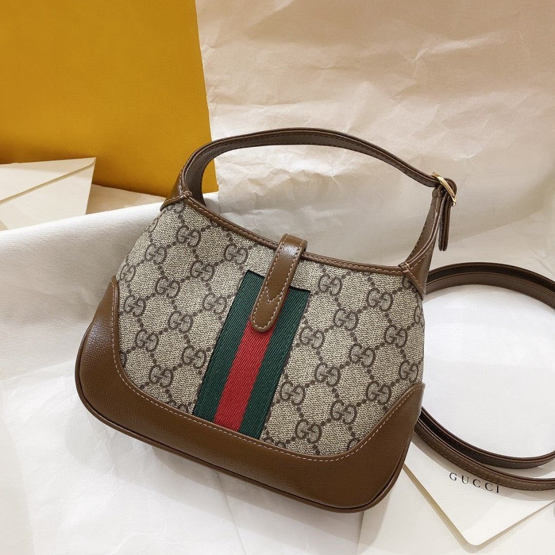 BOLSO DE HOMBRO JACKIE 1961 PEQUEÑO 28 EN LONA BEIGE Y PIEL DE BECERRO MARRÓN