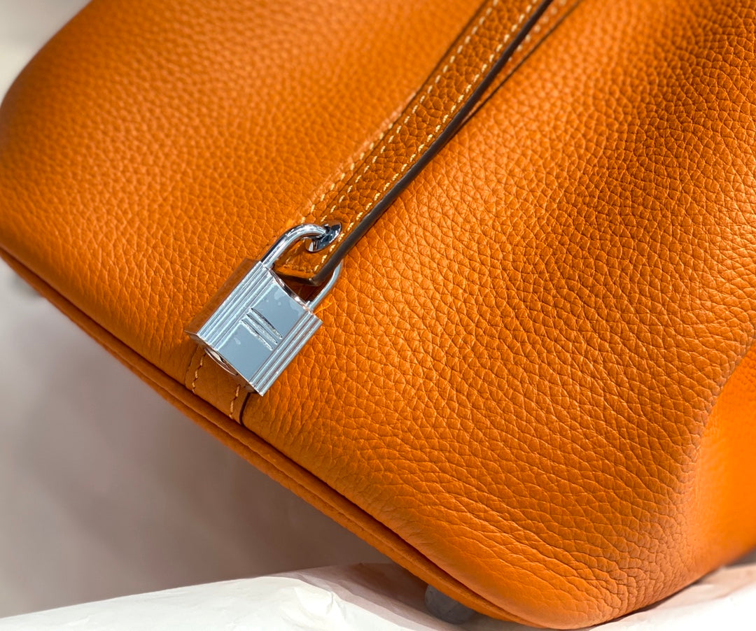 Cerradura picotin 22 naranja togo shw