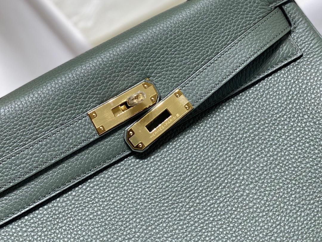 hm kelly 32 cm cuir togo vert amande accessoires dorés