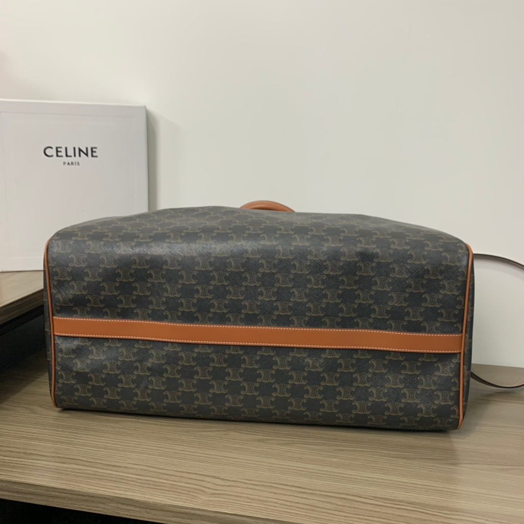 BOLSA DE VIAJE 50 EN LONA TRIOMPHE NEGRA CON ESTAMPADO DE PERRO