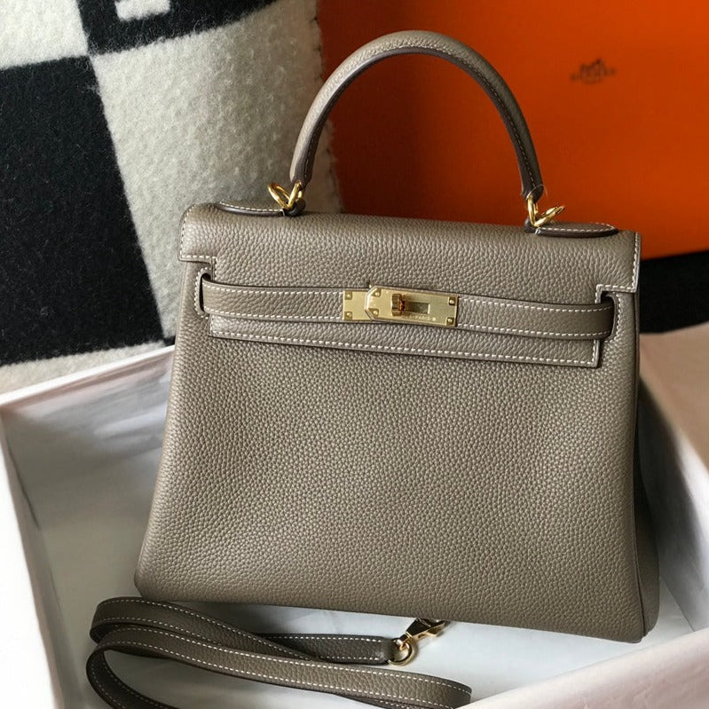 hm kelly 32 cm cuir togo taupe accessoires dorés