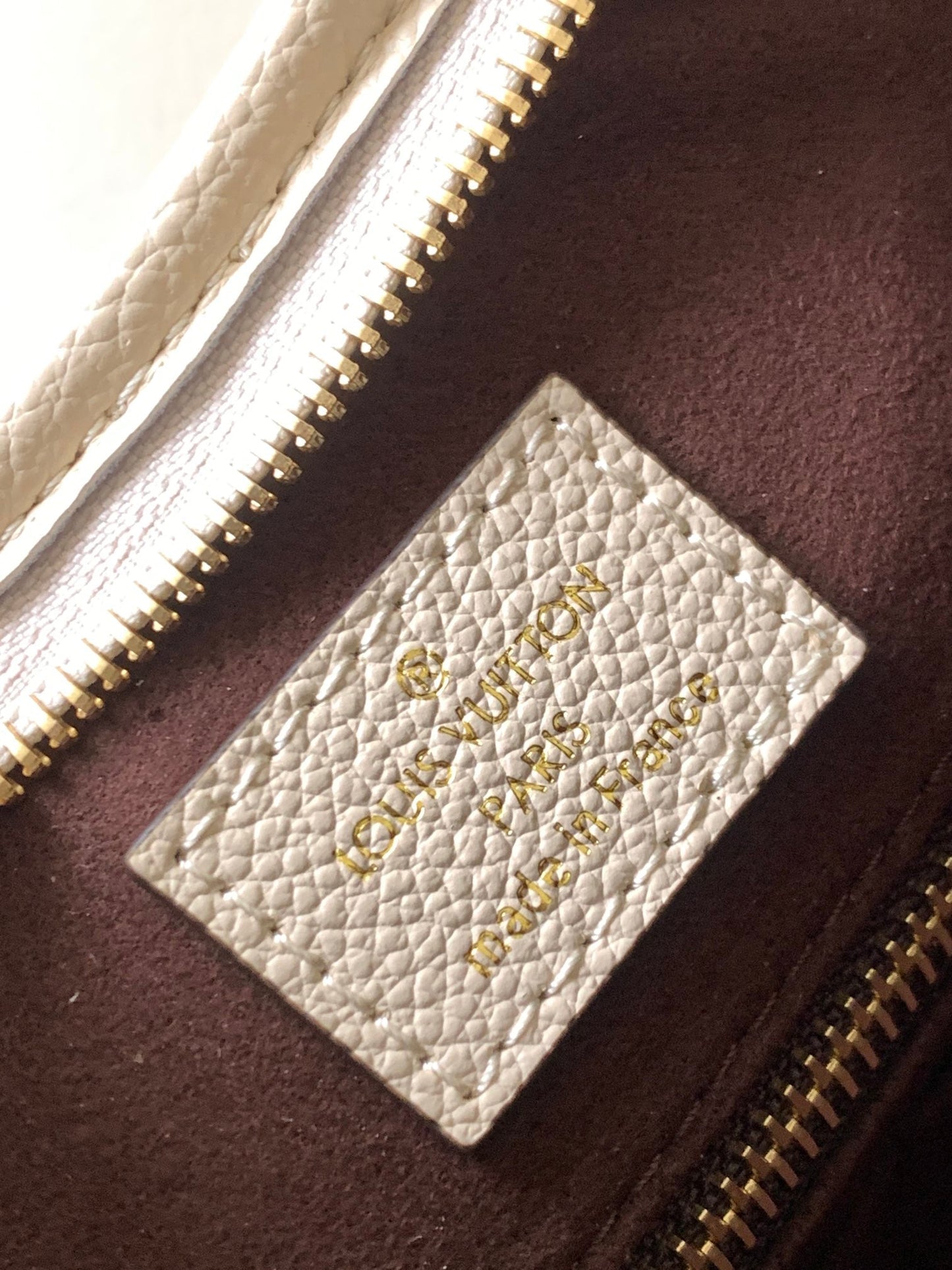 BOLSO DE MANO PM 29 MONOGRAMA BLANCO DE PIEL DE VACA GRANULADA