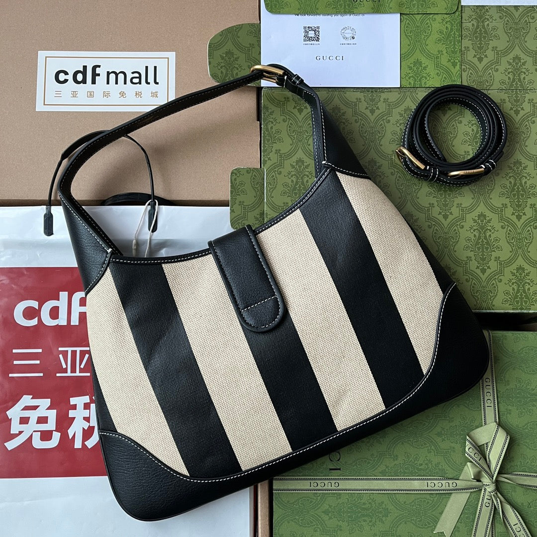 SAC À BANDOULIÈRE MOYEN 39 EN TOILE BEIGE MÉLANGÉE CUIR DE VEAU NOIR QUINCAILLERIE DORÉE