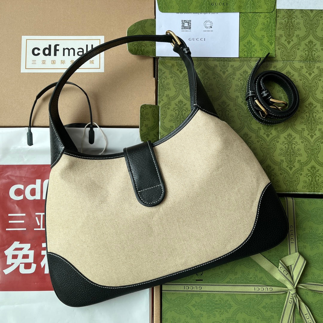 BOLSO MEDIANO APHRODITE 39 DE LONA BEIGE Y PIEL DE BECERRO NEGRA CON HERRAJES DORADOS