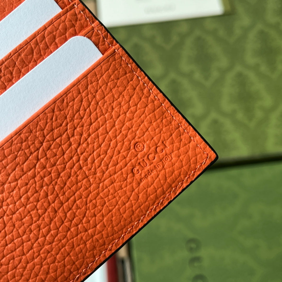 CARTERA 11 EN PIEL DE BECERRO REVESTIDA NARANJA