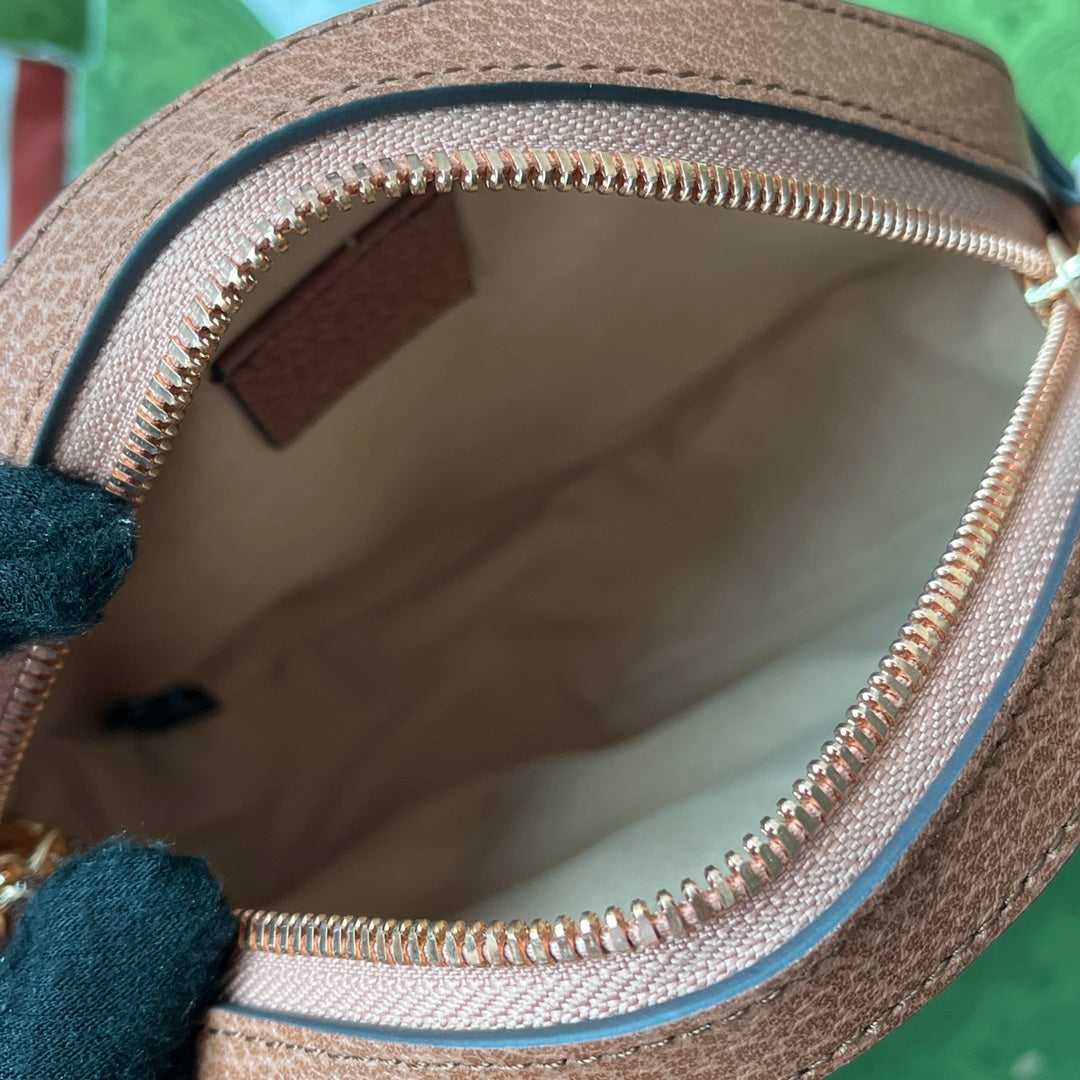 BOLSO DE HOMBRO OPHIDIA MINI REDONDO DE 18" EN LONA ROSA RUBORIZADO Y ADORNO DE CUERO MARRÓN