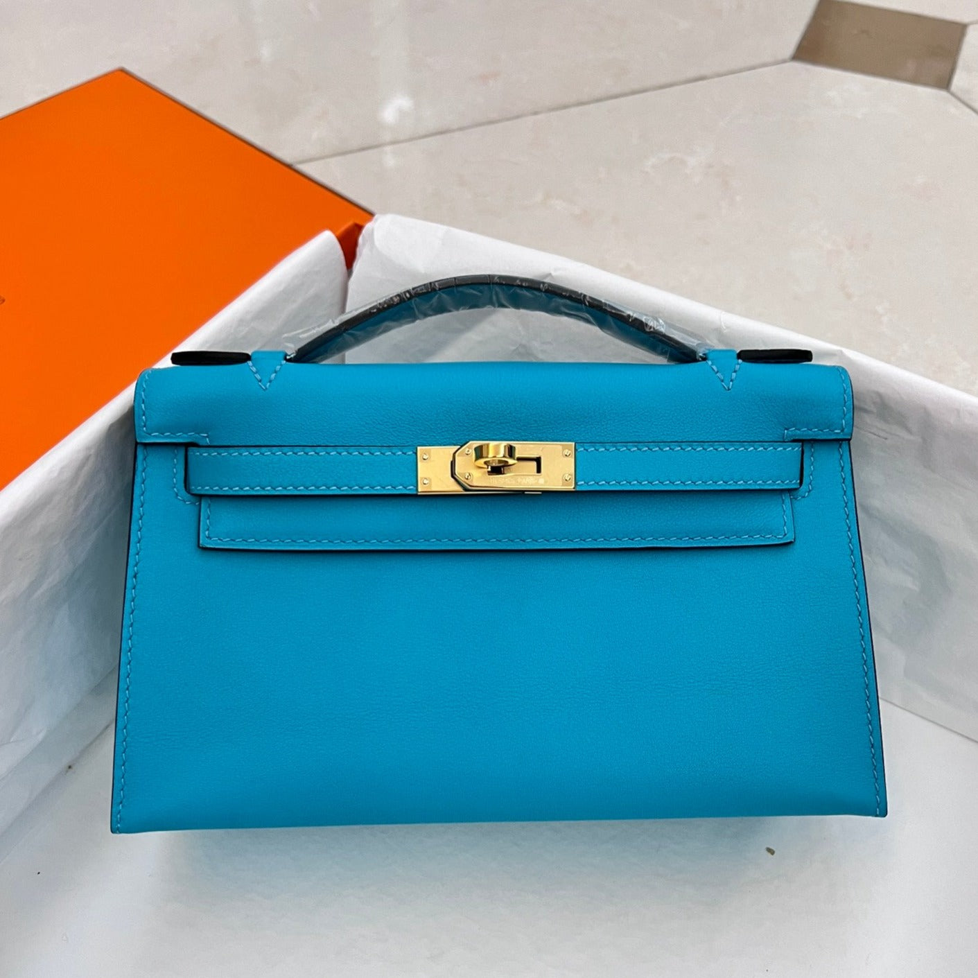 POCHETTE HM KELLY 22 CM CÉRULÉEN SWIFT QUINCAILLERIE DORÉ