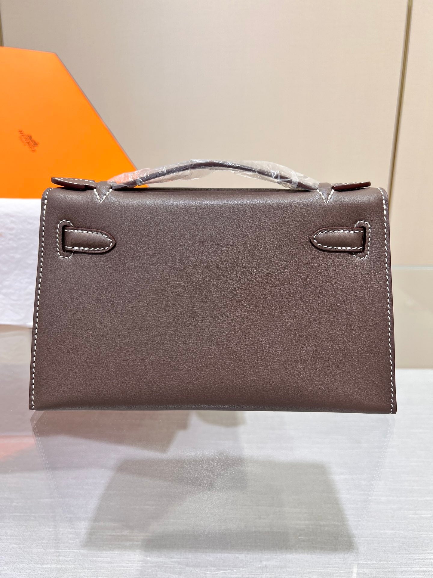 BOLSO DE POCHETTE HM KELLY DE 22 CM CON HERRAJES DE PLATA ETAN SWIFT