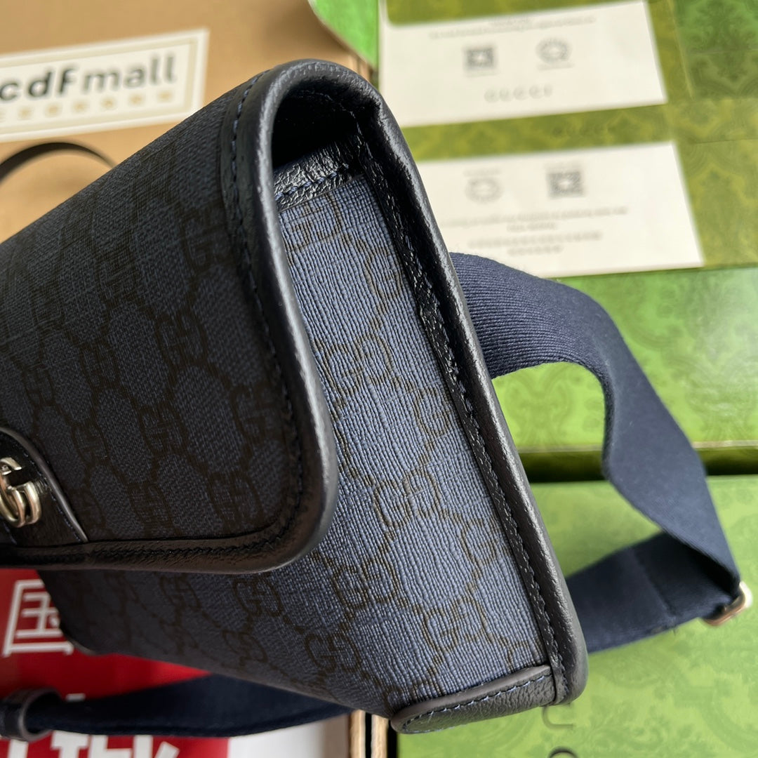 Petit sac ceinture OPHIDIA 23 en toile monogrammée bleu foncé et bordure en cuir d'agneau noir