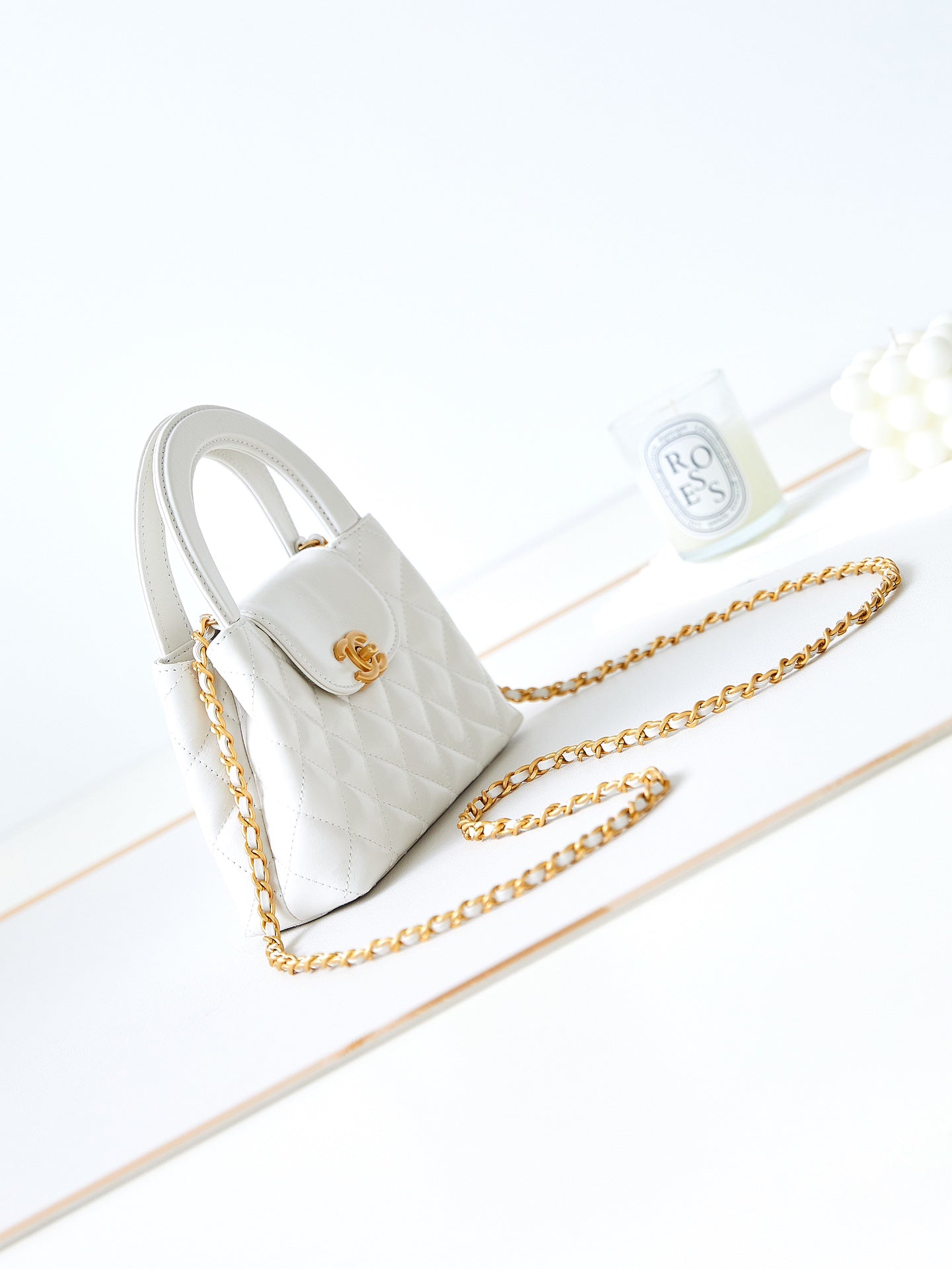 Bolso shopper Kelly CC 24A Nano de 19 cm en piel de cordero blanca