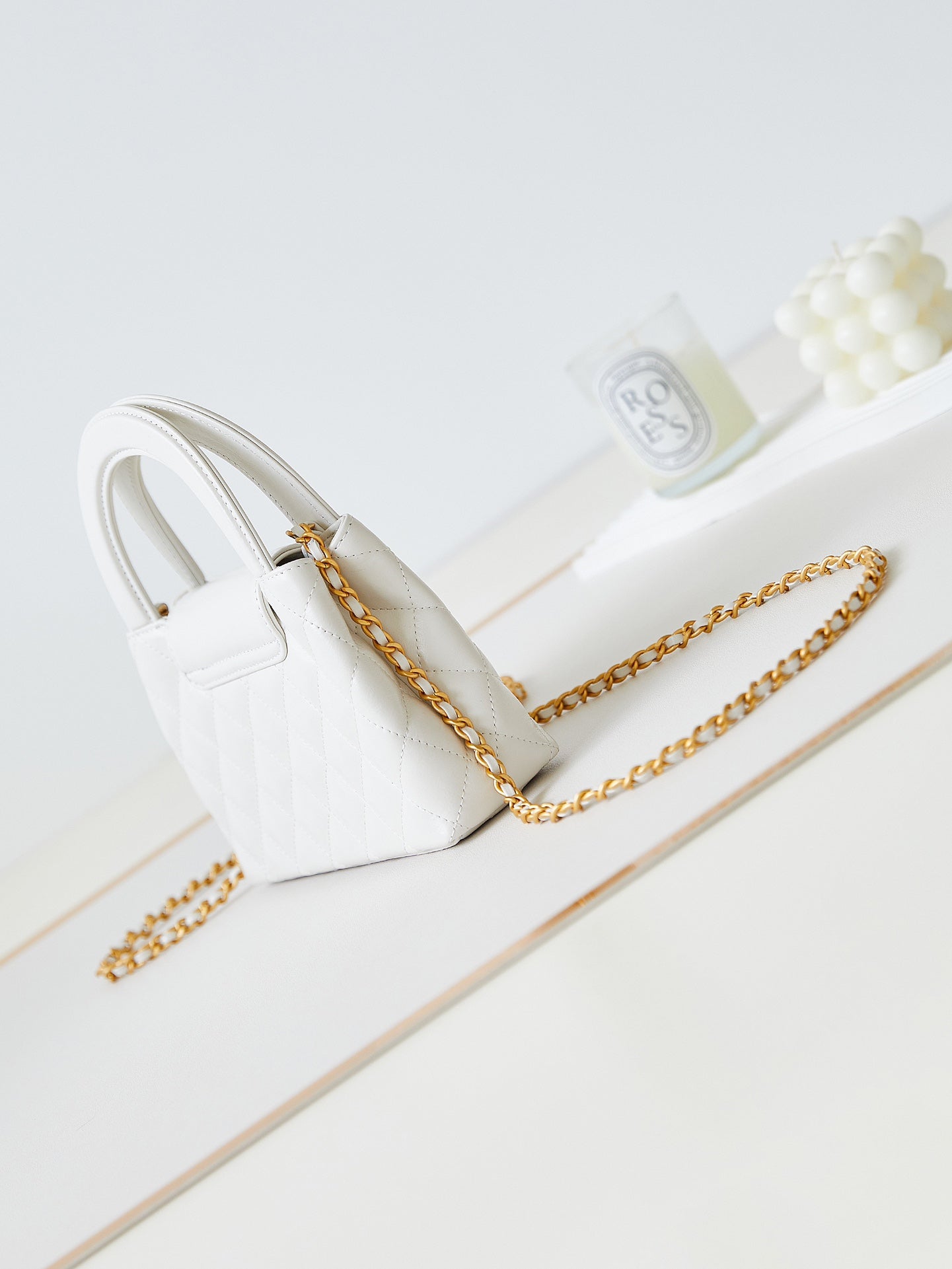 Bolso shopper Kelly CC 24A Nano de 19 cm en piel de cordero blanca