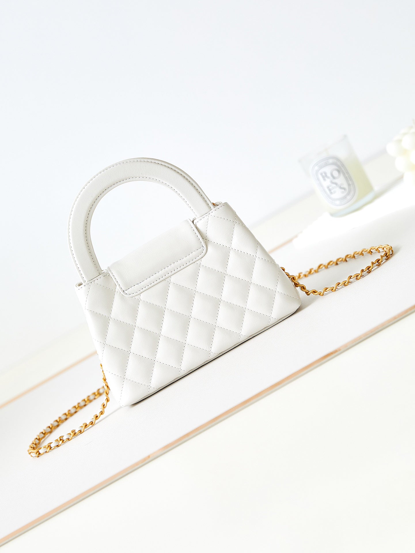 Bolso shopper Kelly CC 24A Nano de 19 cm en piel de cordero blanca