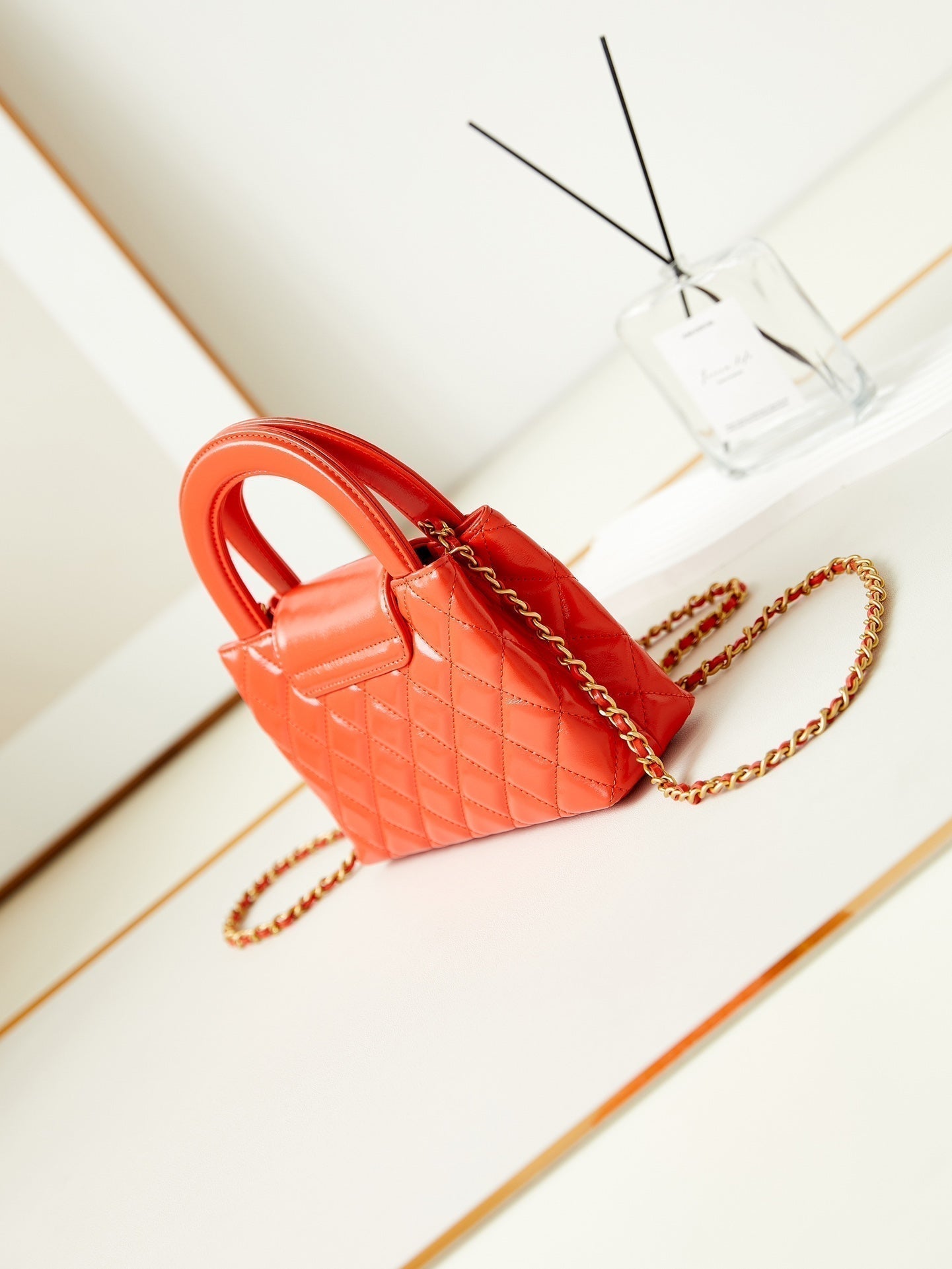 Sac cabas Kelly CC 24A Nano 19 cm en cuir d'agneau orange vif