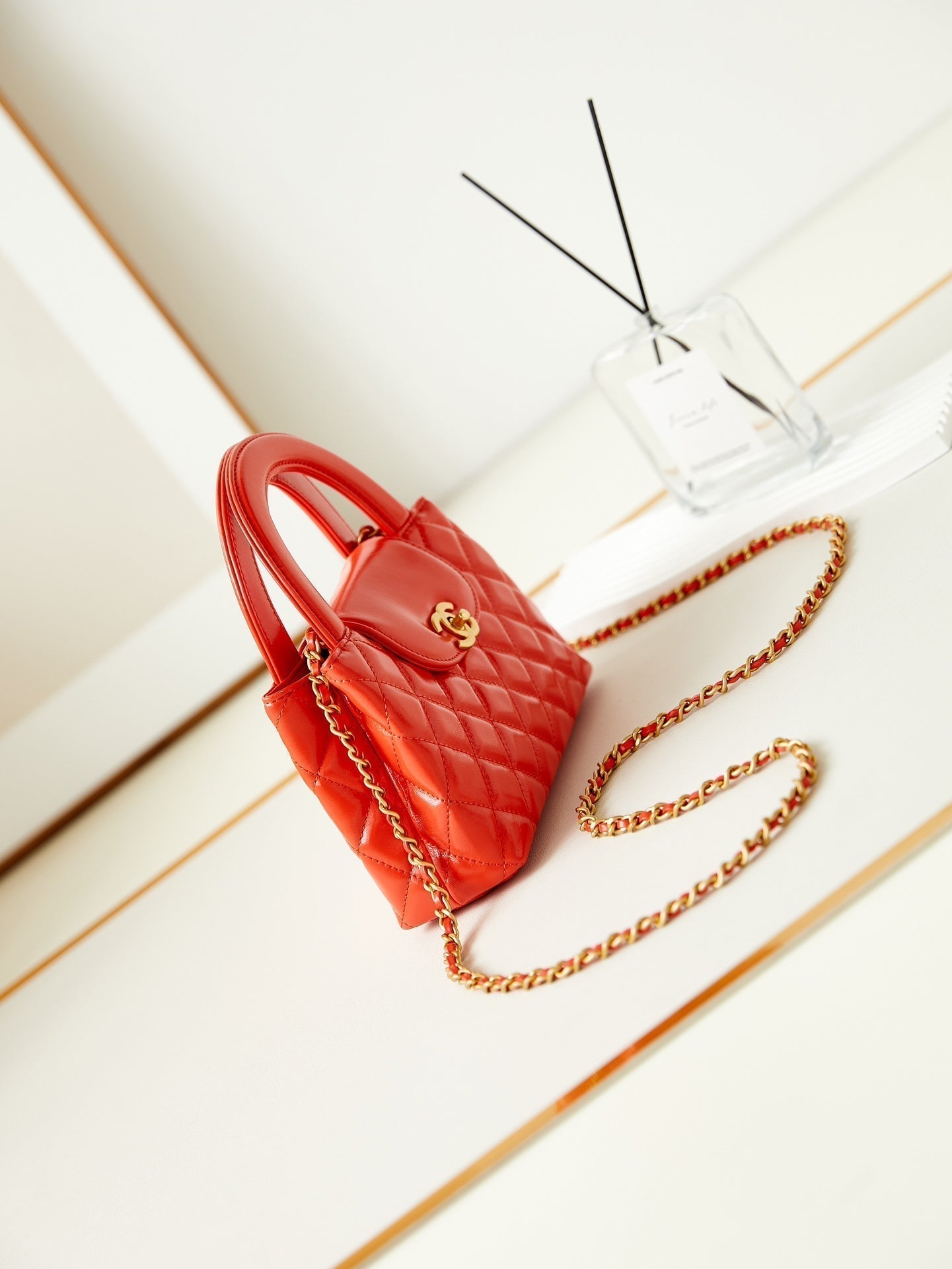 Sac cabas Kelly CC 24A Nano 19 cm en cuir d'agneau orange vif