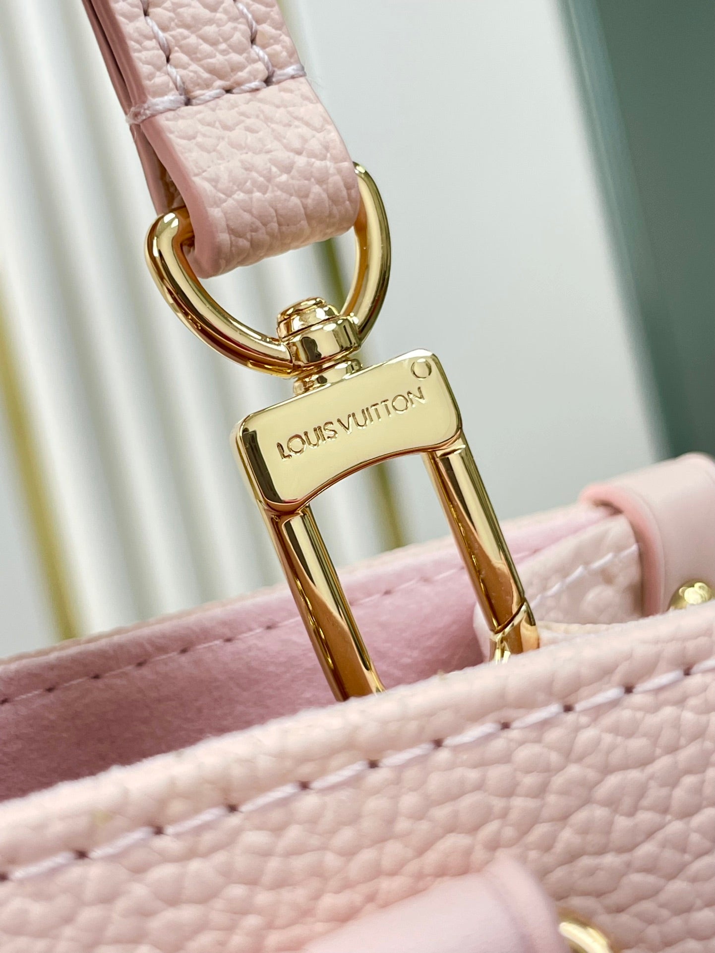 ONTHEGO PM 25 DE PIEL EMPREINTE MONOGRAMA ROSA OPALE
