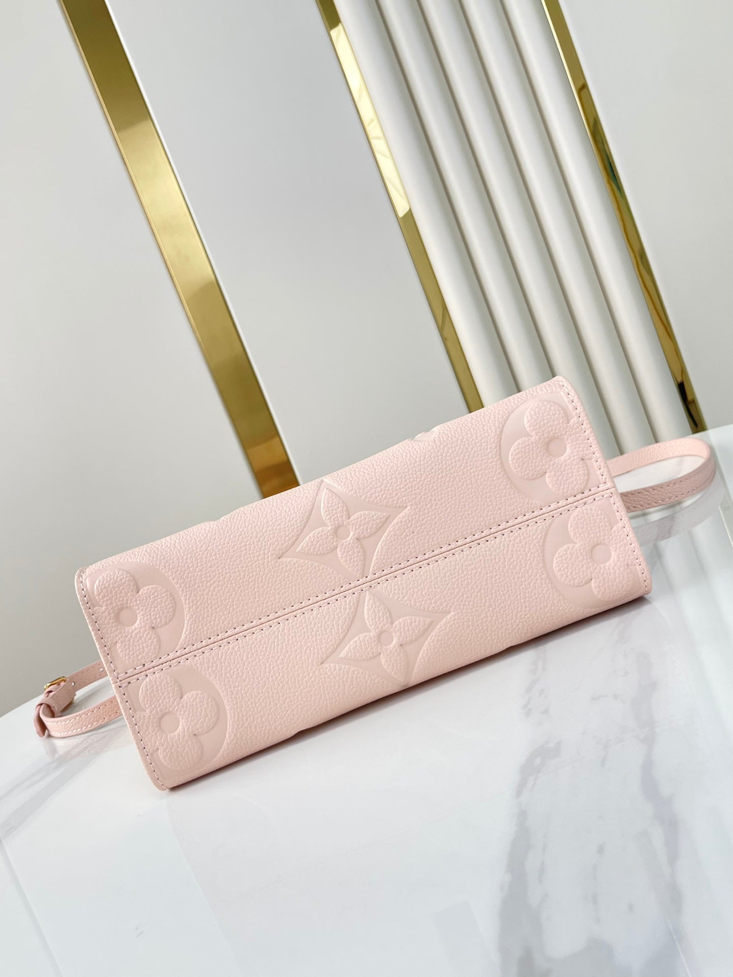 ONTHEGO PM 25 DE PIEL EMPREINTE MONOGRAMA ROSA OPALE