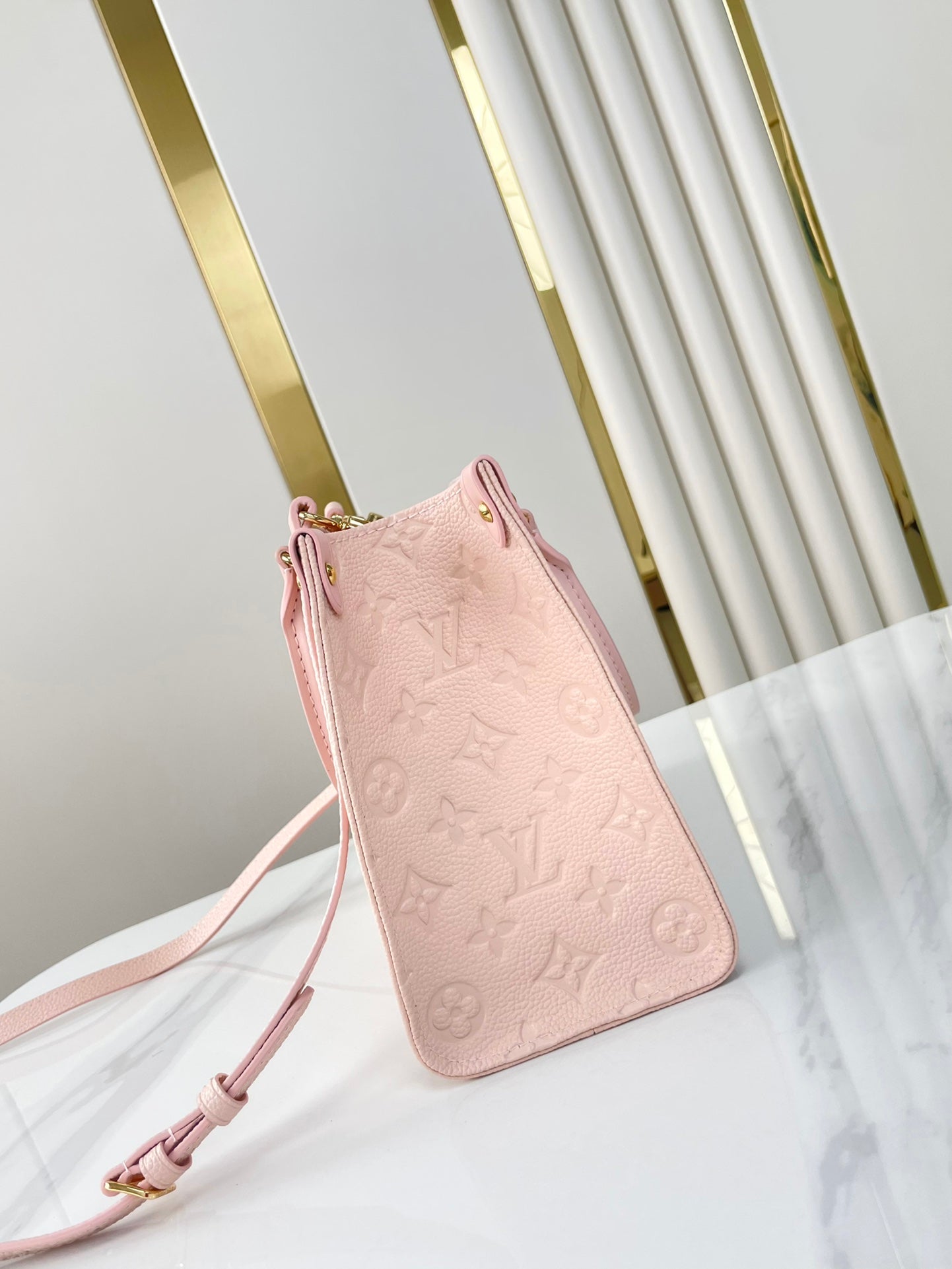 ONTHEGO PM 25 DE PIEL EMPREINTE MONOGRAMA ROSA OPALE
