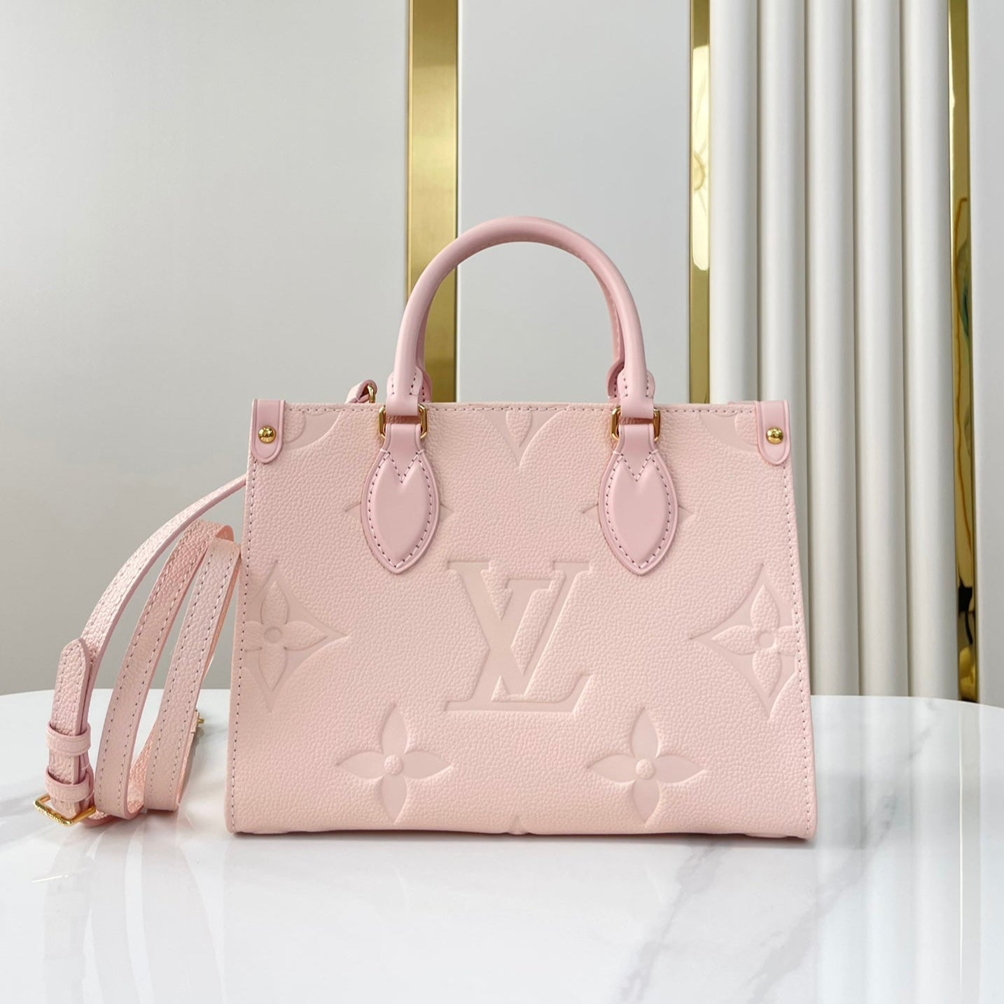 ONTHEGO PM 25 DE PIEL EMPREINTE MONOGRAMA ROSA OPALE