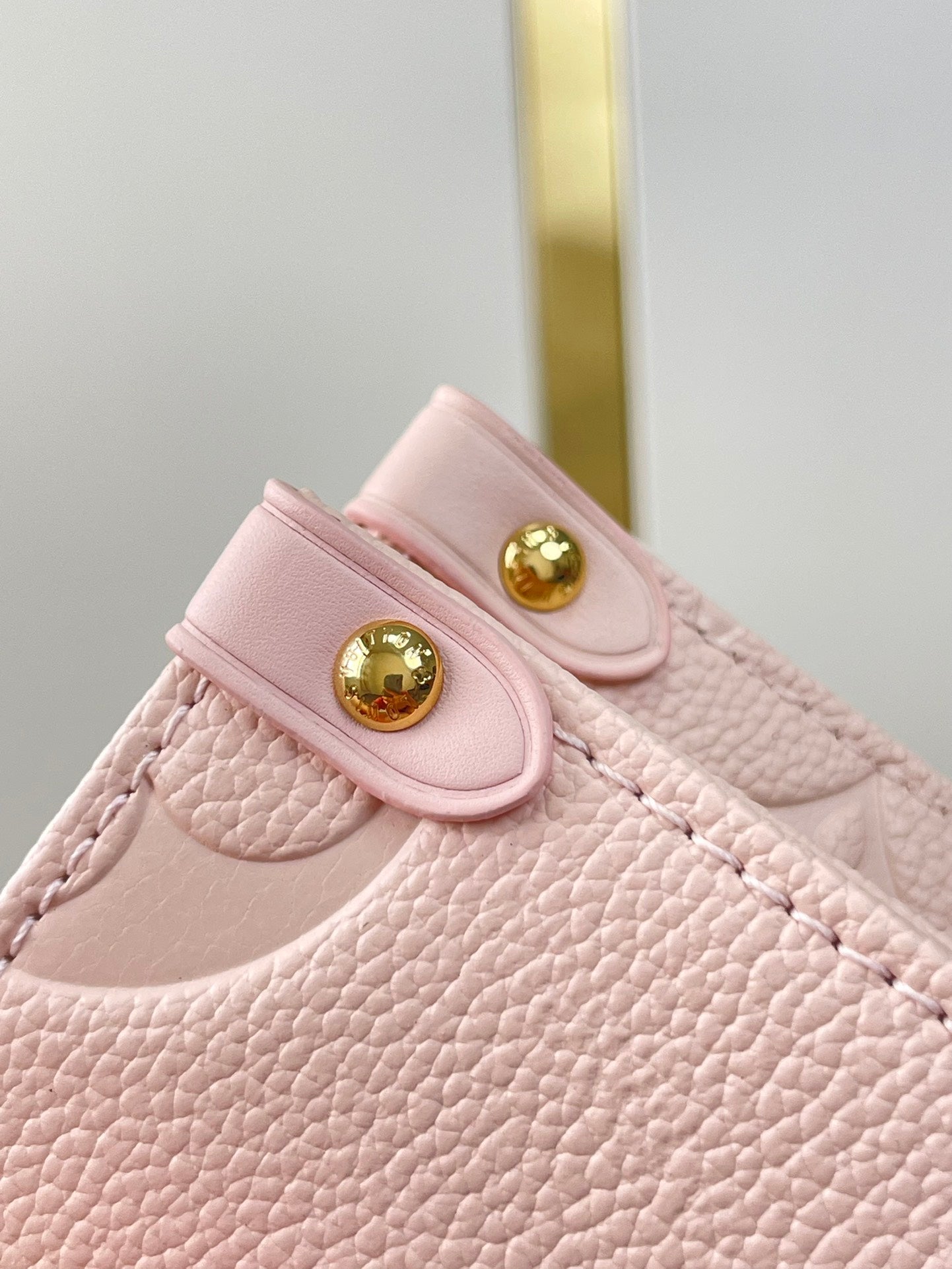 ONTHEGO PM 25 DE PIEL EMPREINTE MONOGRAMA ROSA OPALE