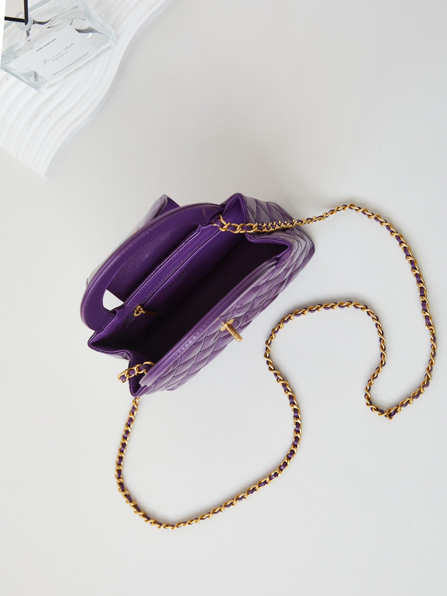 Bolso shopper Kelly CC 24A Nano de 19 cm en piel de cordero morada